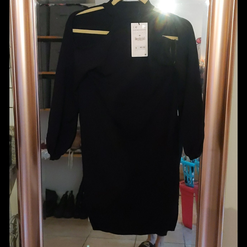 Zara shoulder showing black dress